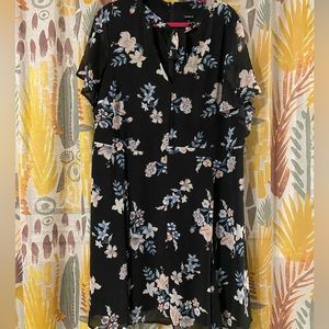 Black Torrid dress with pink and blue floral print.